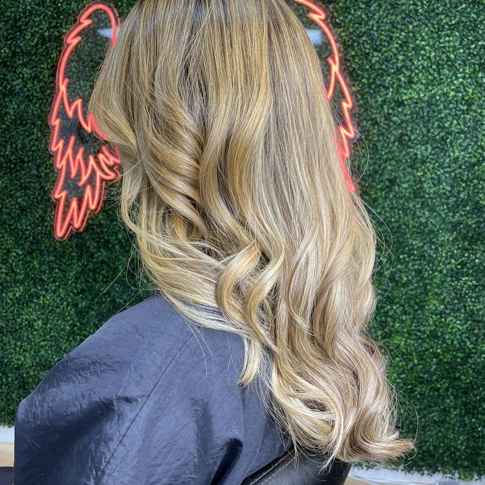 Medium Ash Blonde Waves Back View — Blonde Sew In Styles 2027