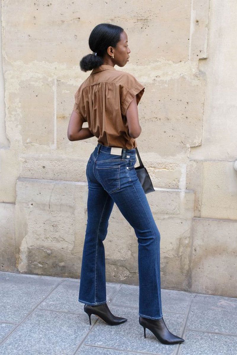Dark Blue Bootcut Jeans with Brown Collared Shirt and Ankle Boots Dark Blue Bootcut Jeans with Brown Collared Shirt and Ankle Boots — Bootcut Jeans Outfits 2027 with Tank Top