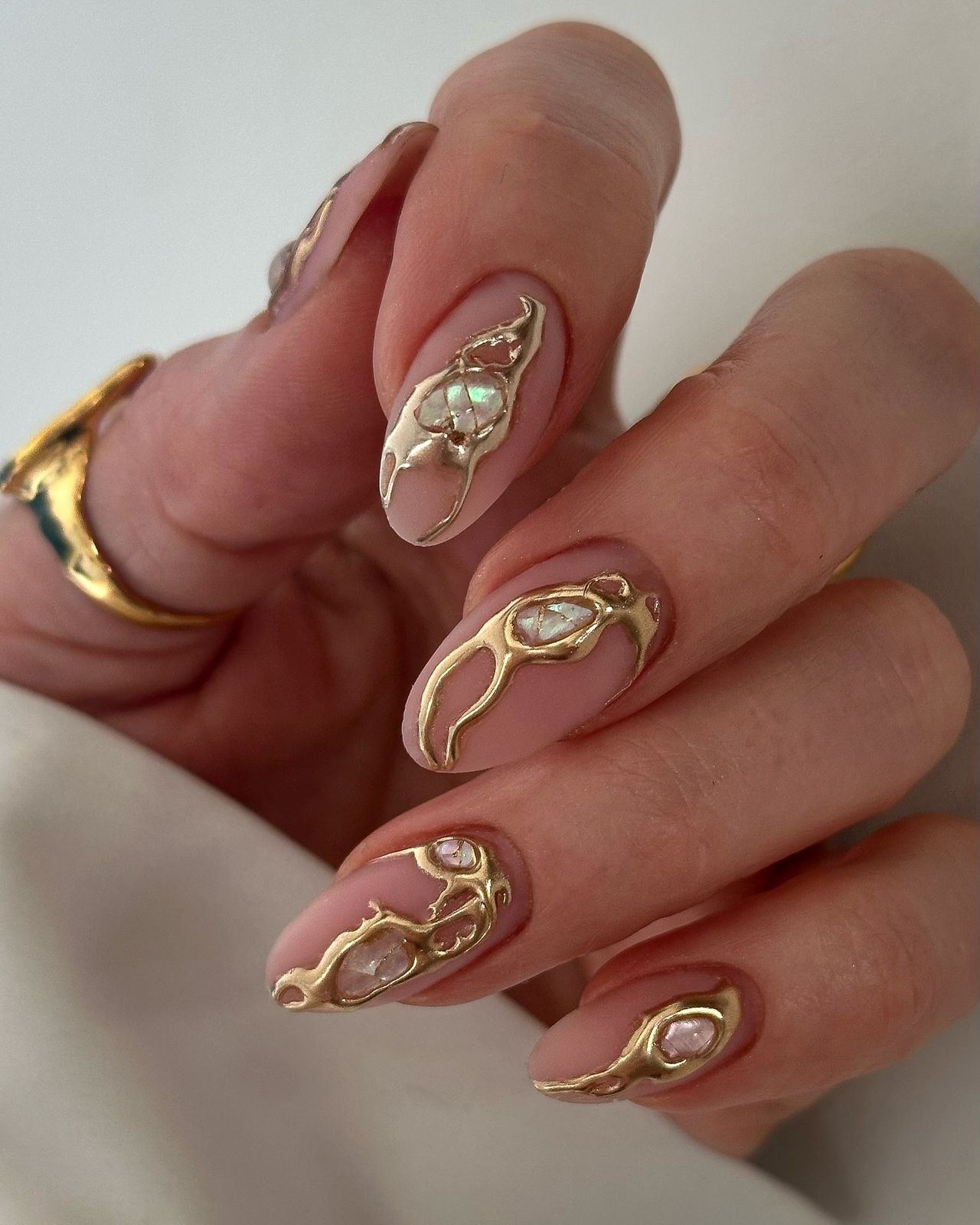 3D Gold Embellishments on Nude Oval 3D Gold Embellishments on Nude Oval — Gold Birthday Nails 2027