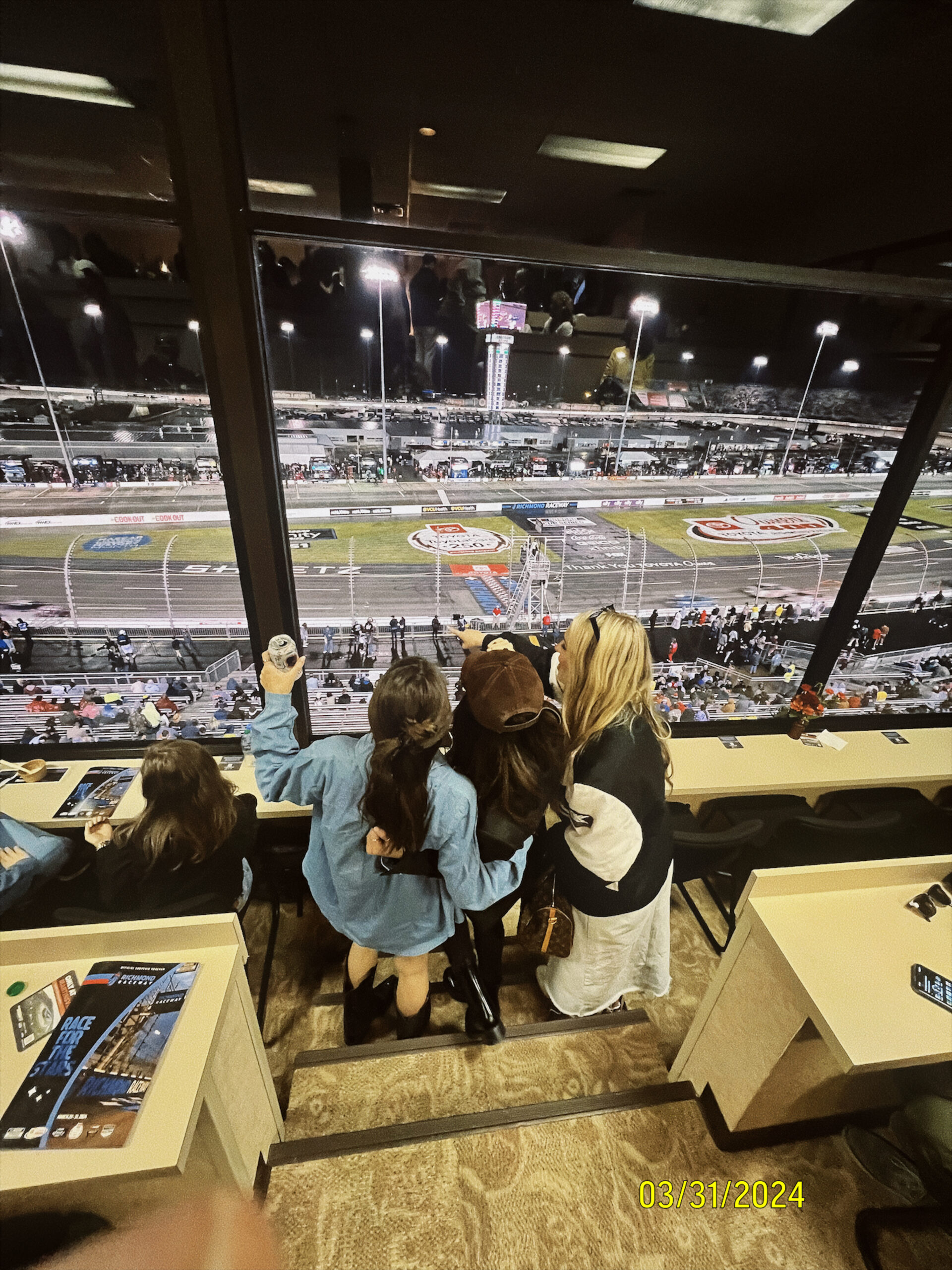 Denim Jacket and Graphic Tee with Cowboy Boots — NASCAR Outfits 2027