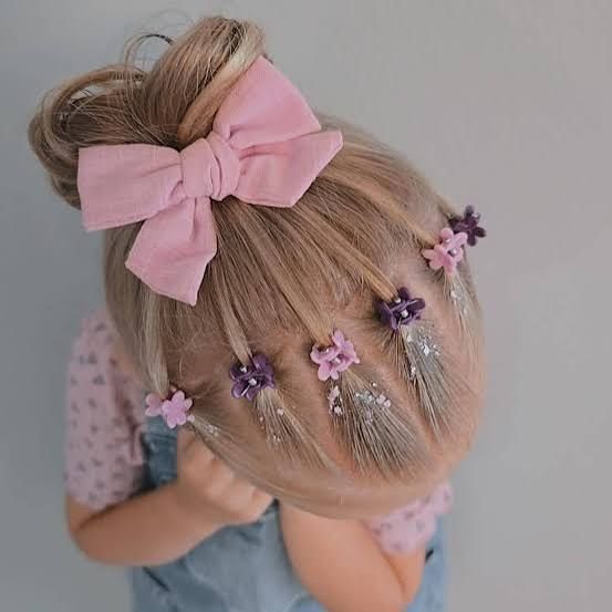 High Bun Face Framing Braids Pink Bow — Ribbons Little Girl Hairstyles 2027