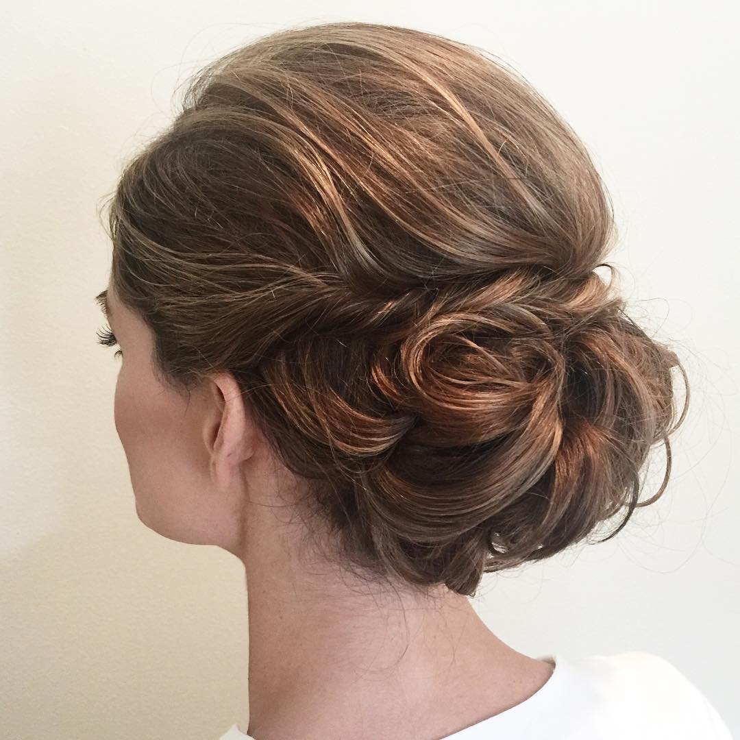 Side Chignon With Wavy Texture Side Chignon With Wavy Texture — Sweet 16 Hairstyles 2027