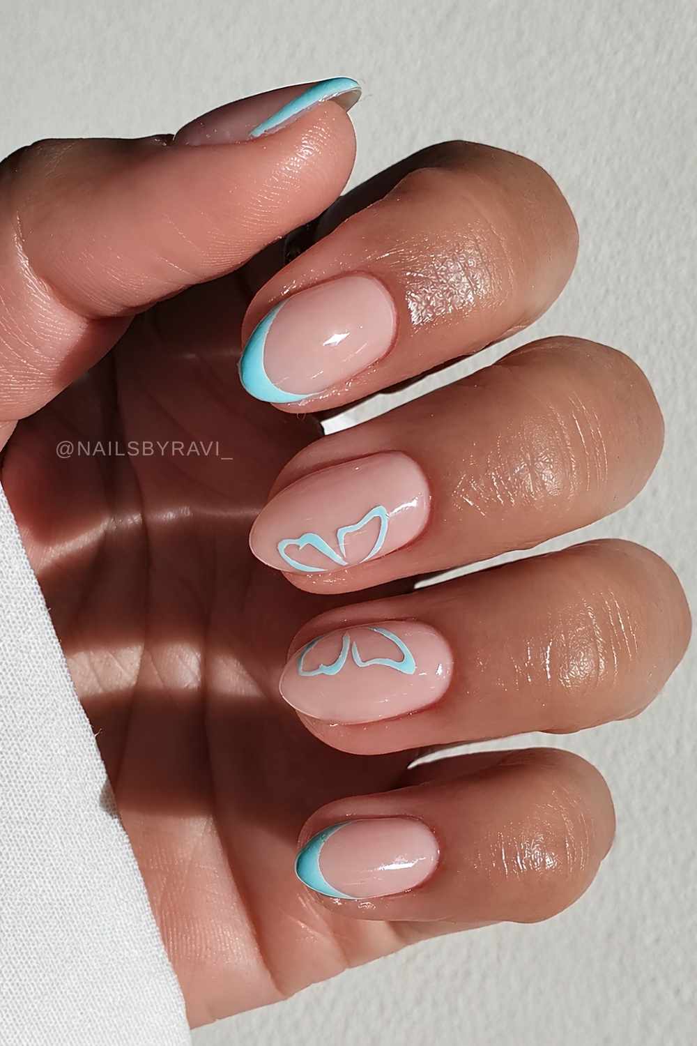 Nude Base Light Blue Butterfly French Tips — With Soft Lighting Short Butterfly Round Nails 2027