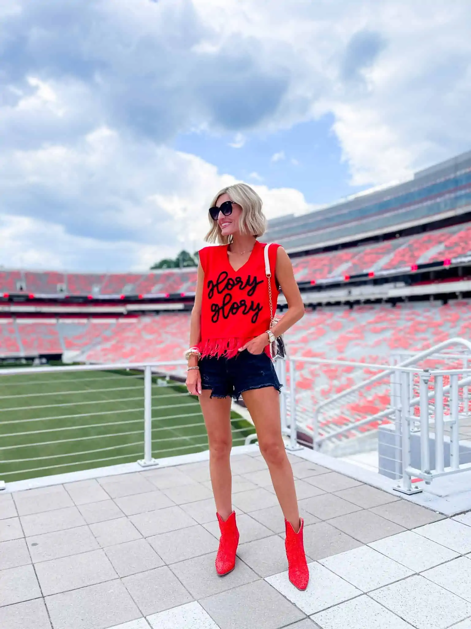 Glitter and Fringe: Red Top with Denim Shorts and Sparkly Boots — College Game Day Outfits 2026