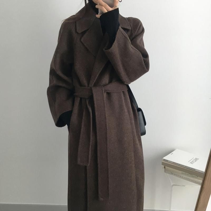Belted Brown Wool Coat Over Black Turtleneck — Winter Minimalist Outfits 2027
