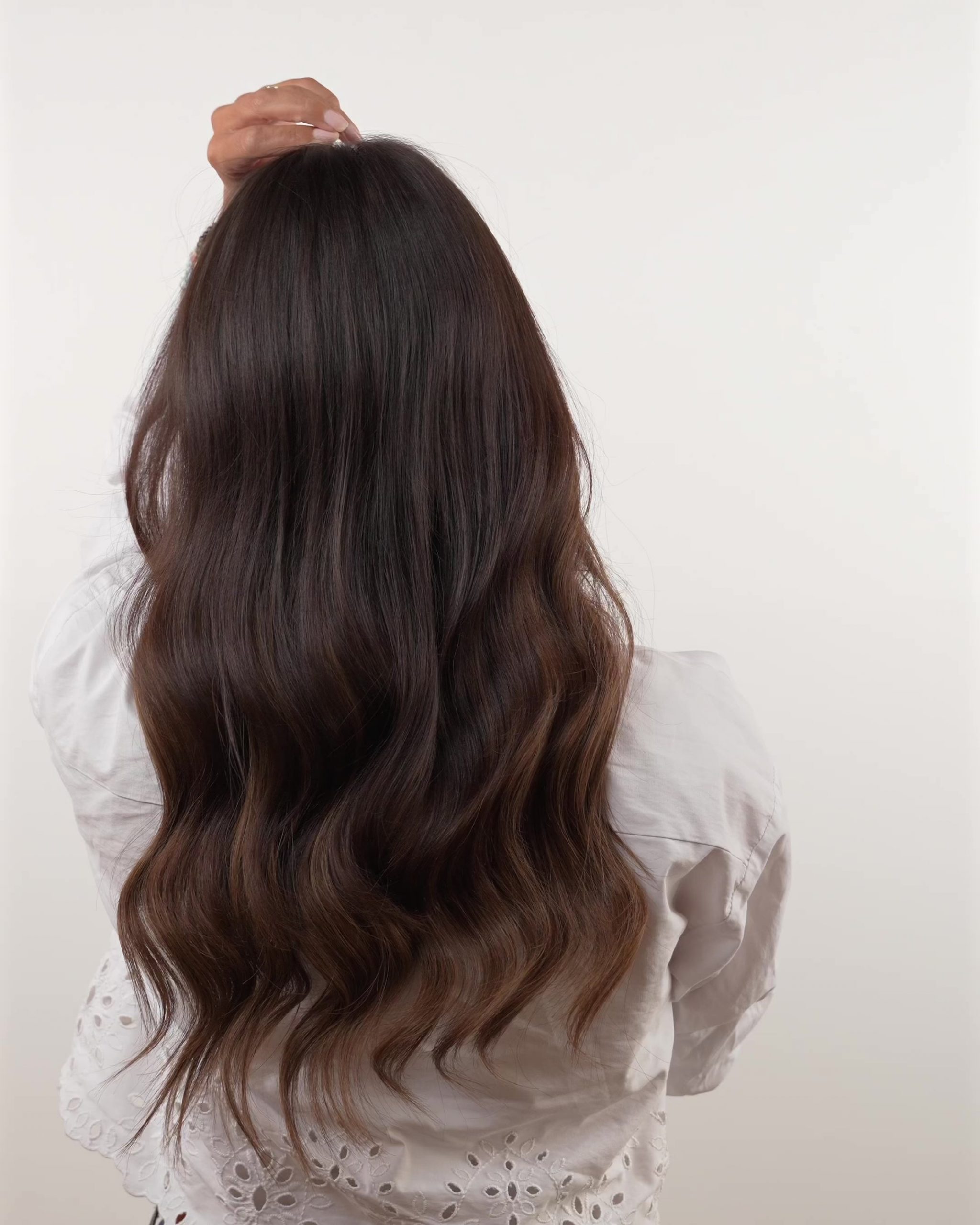 Dark Brown Ombre With Loose Waves Dark Brown Ombre With Loose Waves — Halo Extensions Hairstyles 2027