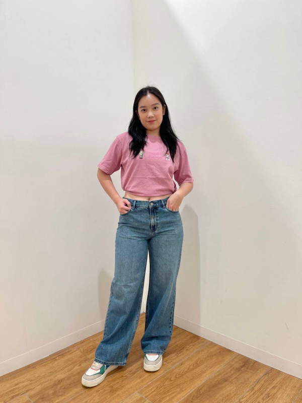 Vibrant Casual: Medium Blue Low-Rise Jeans with Graphic Tee Vibrant Casual: Medium Blue Low-Rise Jeans with Graphic Tee — Low Rise Jeans 2027
