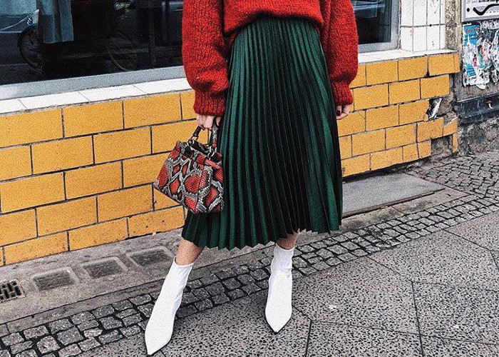Emerald Green Velvet Pleated Skirt with Red Knit Sweater — Pleated Skirt Outfits 2027
