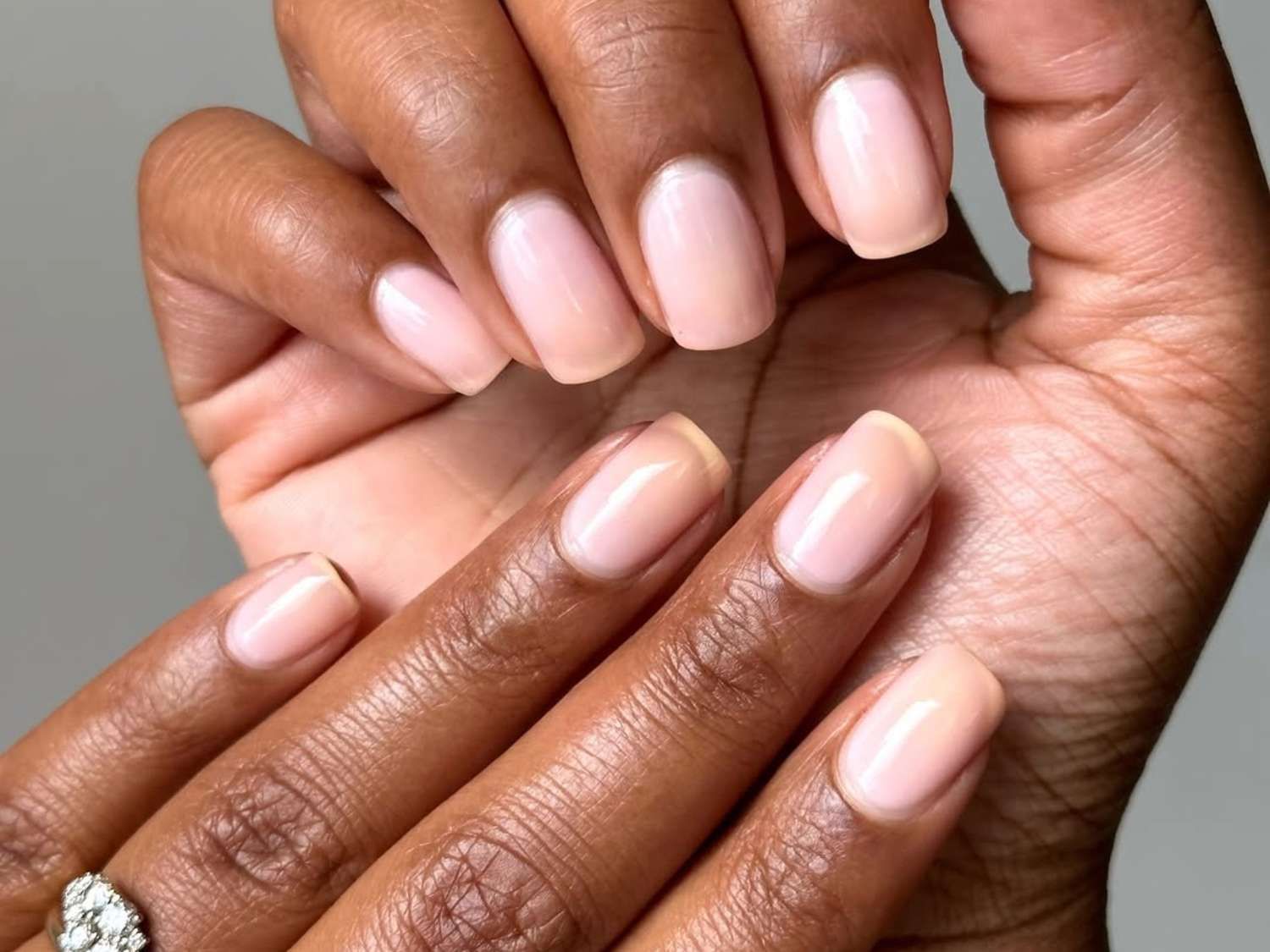 Sheer Pale Pink Nude Short Oval Interlaced Hands Sheer Pale Pink Nude Short Oval Interlaced Hands — Nude Nails 2027 for Mature Hands