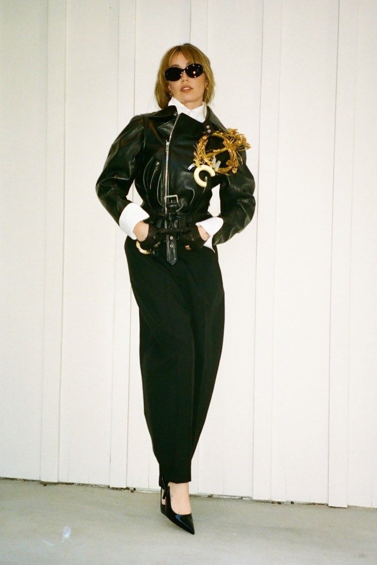 Shoulder Statement: Sculptural Gold Brooch on a Leather Jacket Shoulder Statement: Sculptural Gold Brooch on a Leather Jacket — Brooch Outfits 2027