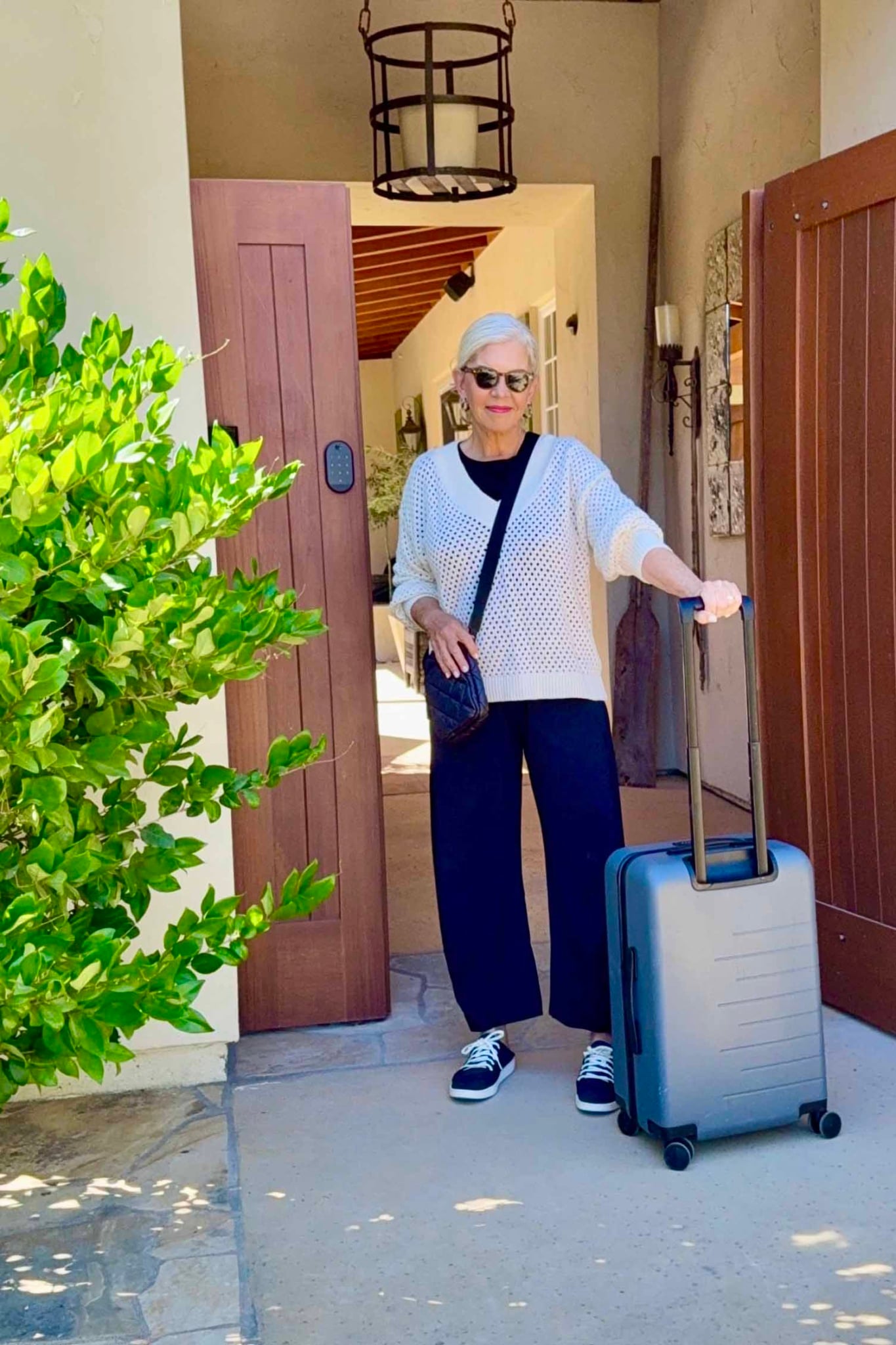 White Open-Knit Cardigan and Navy Trousers White Open-Knit Cardigan and Navy Trousers — Travel Outfits Europe 2027