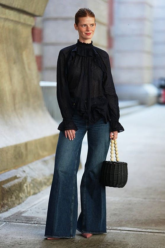 Ruffled Black Blouse with Blue Bootcut Jeans Ruffled Black Blouse with Blue Bootcut Jeans — Blue Bootcut Jeans Outfits 2027