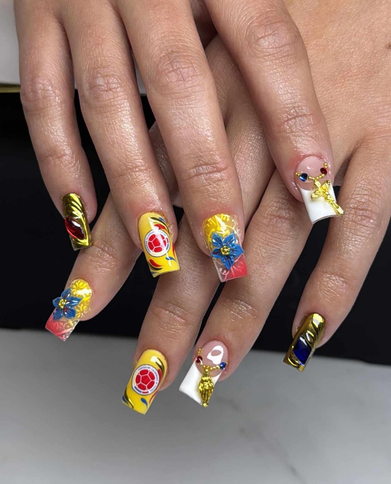 Visual Idea — The Hands Are Posed With Fingers Spread Visual Idea — The Hands Are Posed With Fingers Spread — Cheer Nails Team Colors 2027
