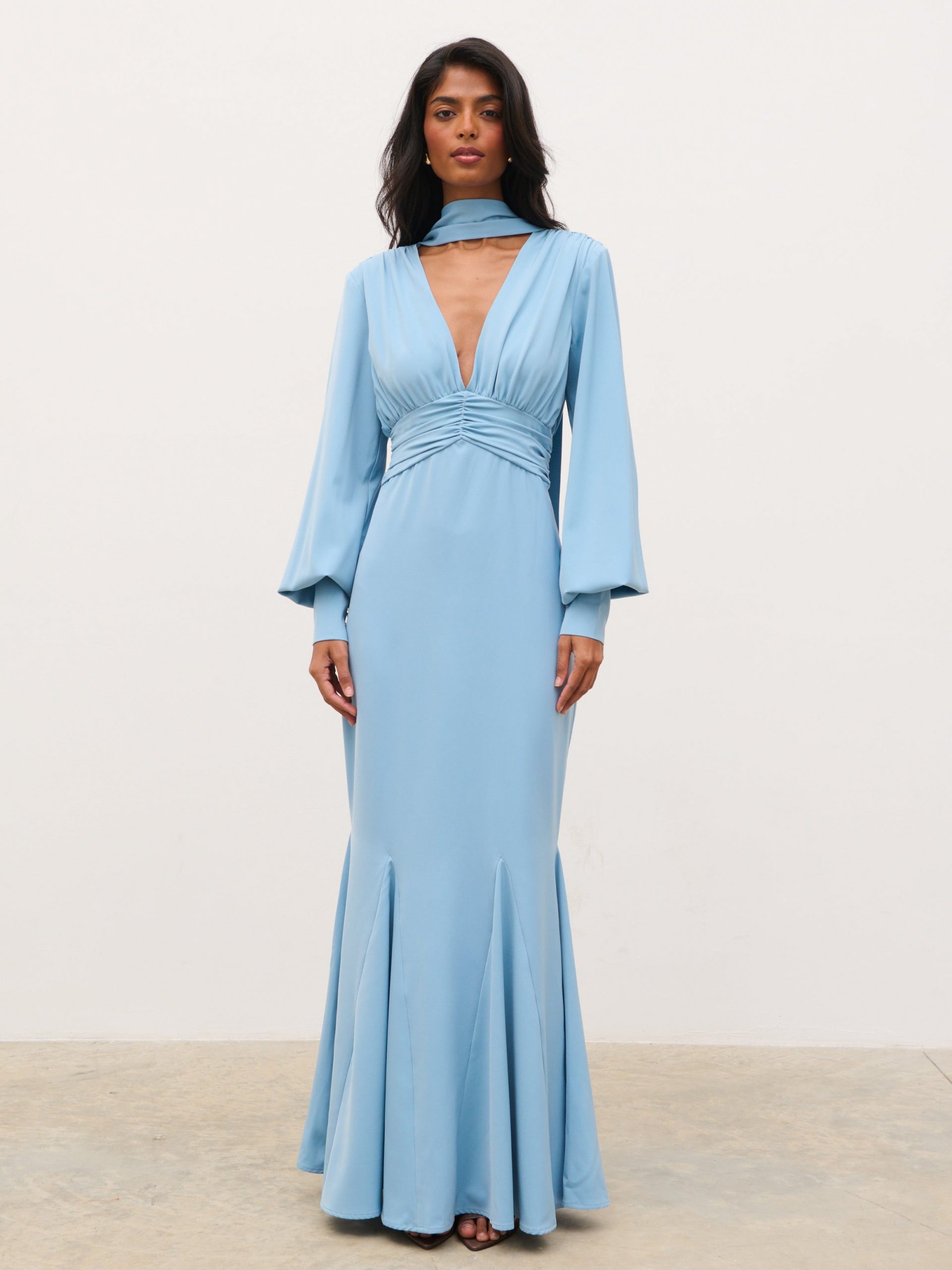 Light Blue Crepe Gown with Plunging Neckline and Voluminous Sleeves Light Blue Crepe Gown with Plunging Neckline and Voluminous Sleeves — Wedding Guest Dresses 2027