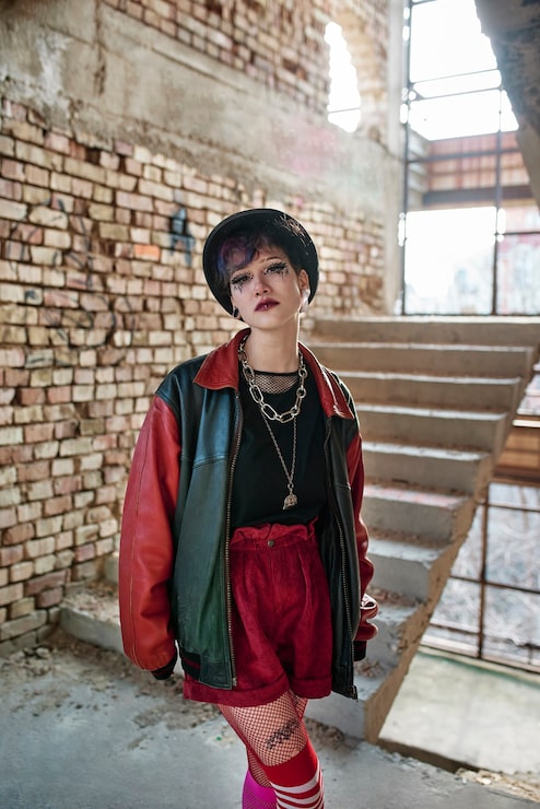 Two-Tone Bomber Jacket and Fishnet Tights: Bold Emo Statement Two-Tone Bomber Jacket and Fishnet Tights: Bold Emo Statement — Emo Outfits 2027