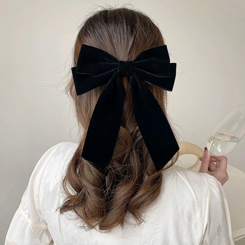 Shoulder-Length Waves With Cascading Bow — Big Bow Hairstyles 2027