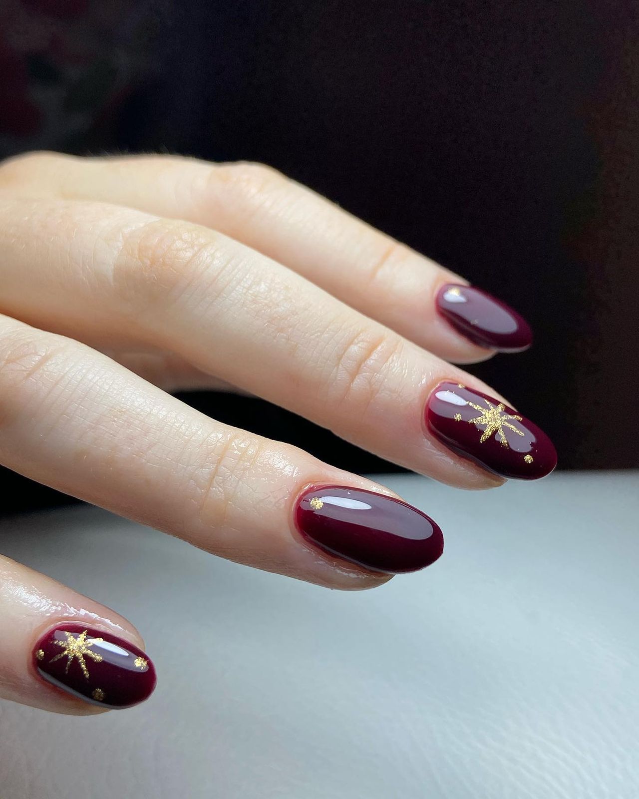 Burgundy With Intricate Gold Starbursts — Burgundy Nails 2027