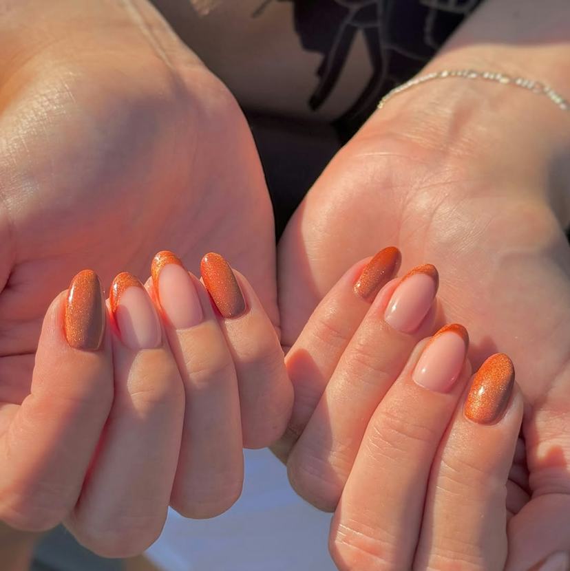 Nude Base with Orange Glitter French Tips Nude Base with Orange Glitter French Tips — Cat Eye Nails 2027