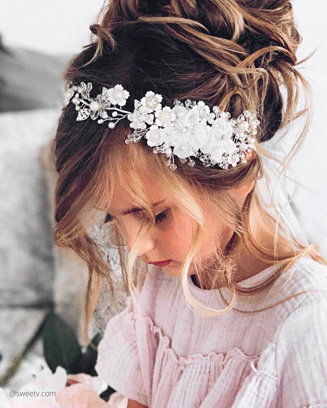 Medium Messy Bun With Floral Accessory Medium Messy Bun With Floral Accessory — Sweet 16 Hairstyles 2027