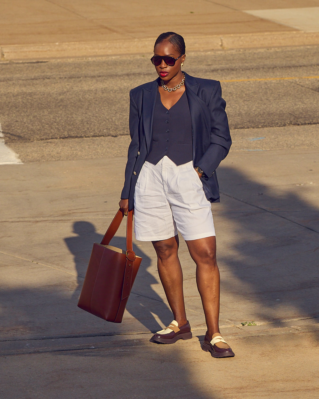 Structured Navy Blazer Over Grey Shorts and White Shirt Structured Navy Blazer Over Grey Shorts and White Shirt — Summer Outfits 2027 with Shorts