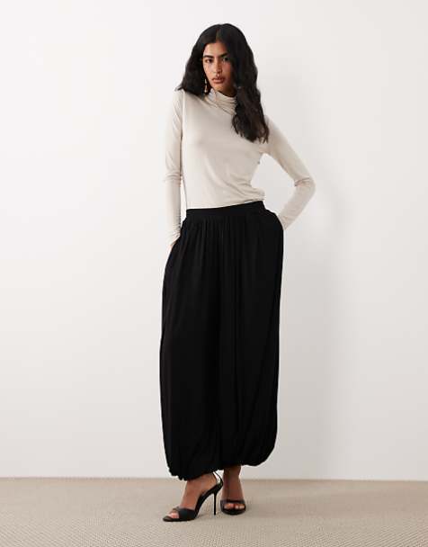 Dramatic Volume Play: The Fitted Turtleneck and Balloon Pants Dramatic Volume Play: The Fitted Turtleneck and Balloon Pants — Modest Outfits 2027