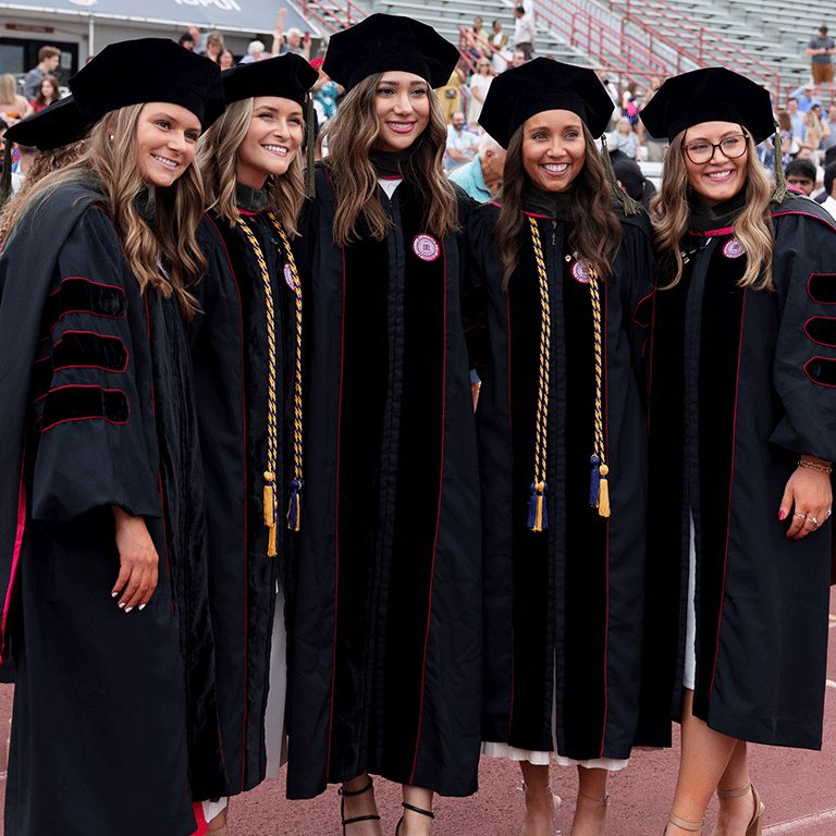 Academic Regalia with Red Trim and Gold Cords for Graduation — Graduation Speaker Outfits 2027