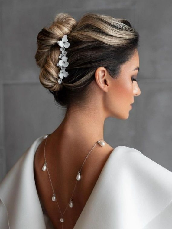 Twisted Updo With Floral Accessory — Gala Hairstyles 2027