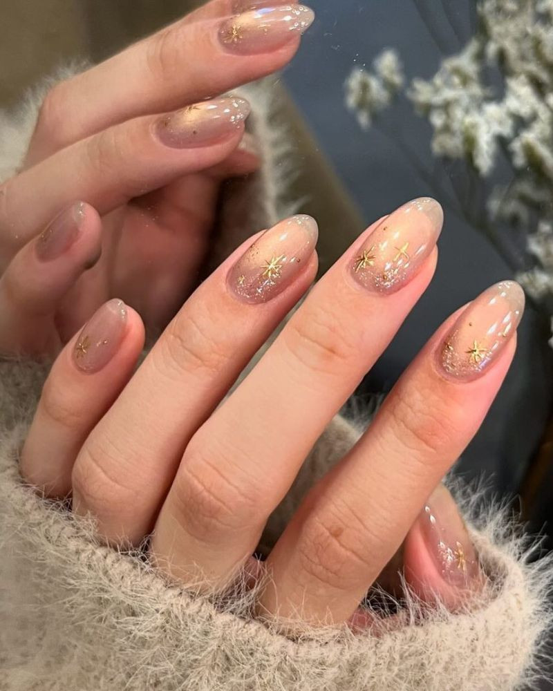 Nude to Gold Gradient with Star Accents Nude to Gold Gradient with Star Accents — Winter Gel Nail Colors 2027