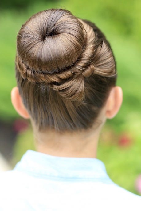 Dark Brown Double Buns with Geometric Braids Dark Brown Double Buns with Geometric Braids — Easter Hairstyles 2027