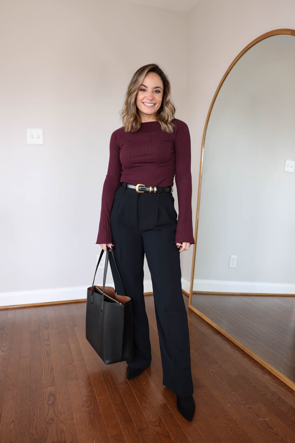 Burgundy Ribbed Top with Black Wide-Leg Trousers and Belt Burgundy Ribbed Top with Black Wide-Leg Trousers and Belt — Winter Office Outfits 2027