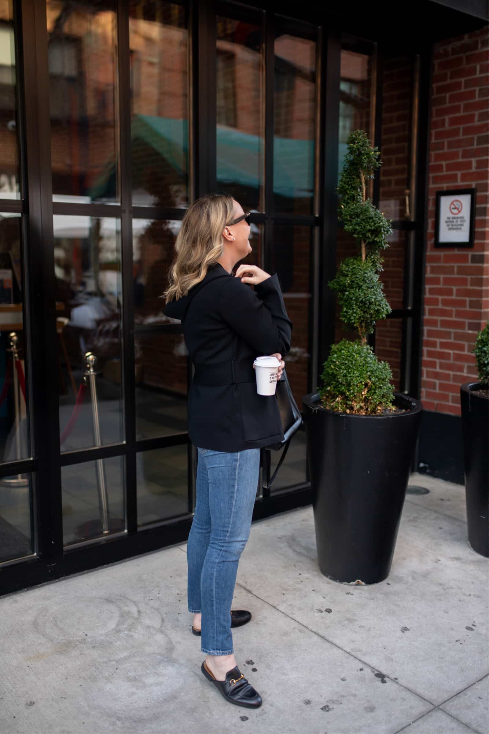Black Blazer, White Top, and Jeans for a Casual Work Environment — First Day of Work Outfits 2027