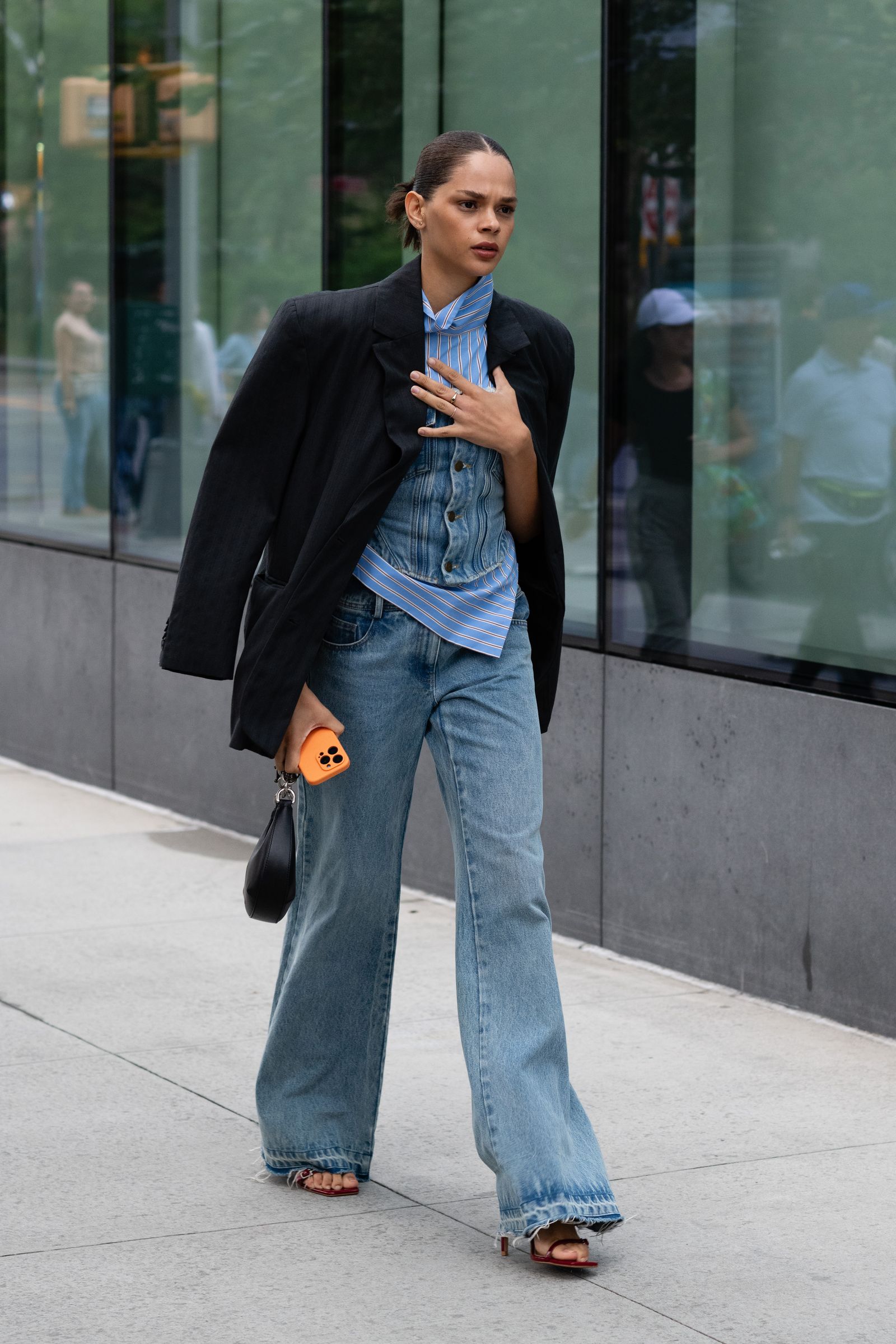 Layered Casual: Wide-Leg Jeans with Denim Vest and Red Heels — Bootcut Jeans Outfits 2027 with Sandals