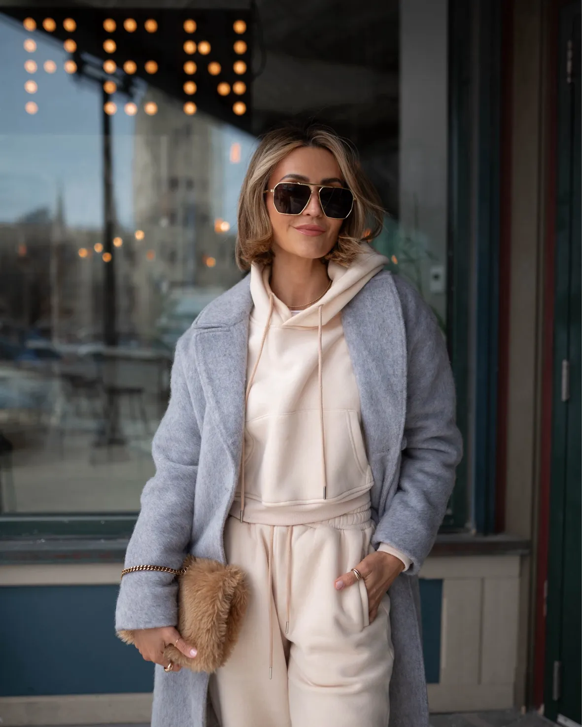 Relaxed Grey Wool Blend Coat Over Cream Hoodie and Sweatpants Relaxed Grey Wool Blend Coat Over Cream Hoodie and Sweatpants — Winter Grey Outfits 2027
