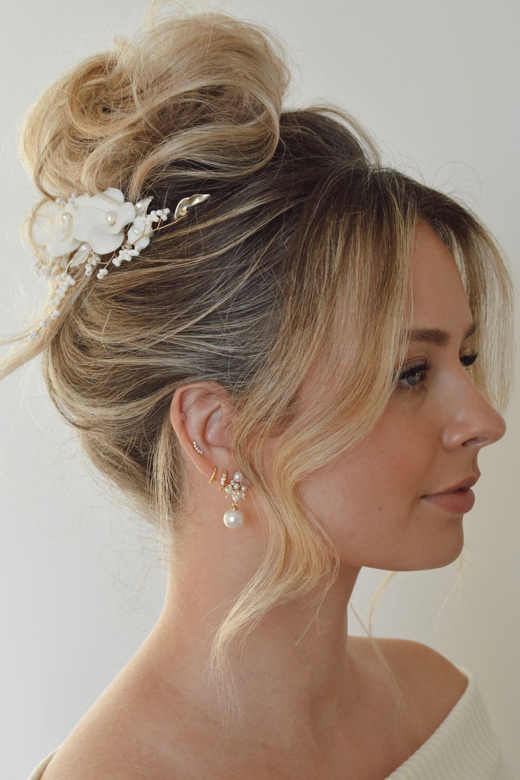 High Messy Bun With Face-Framing Pieces — Knotted Bun Hairstyles 2027