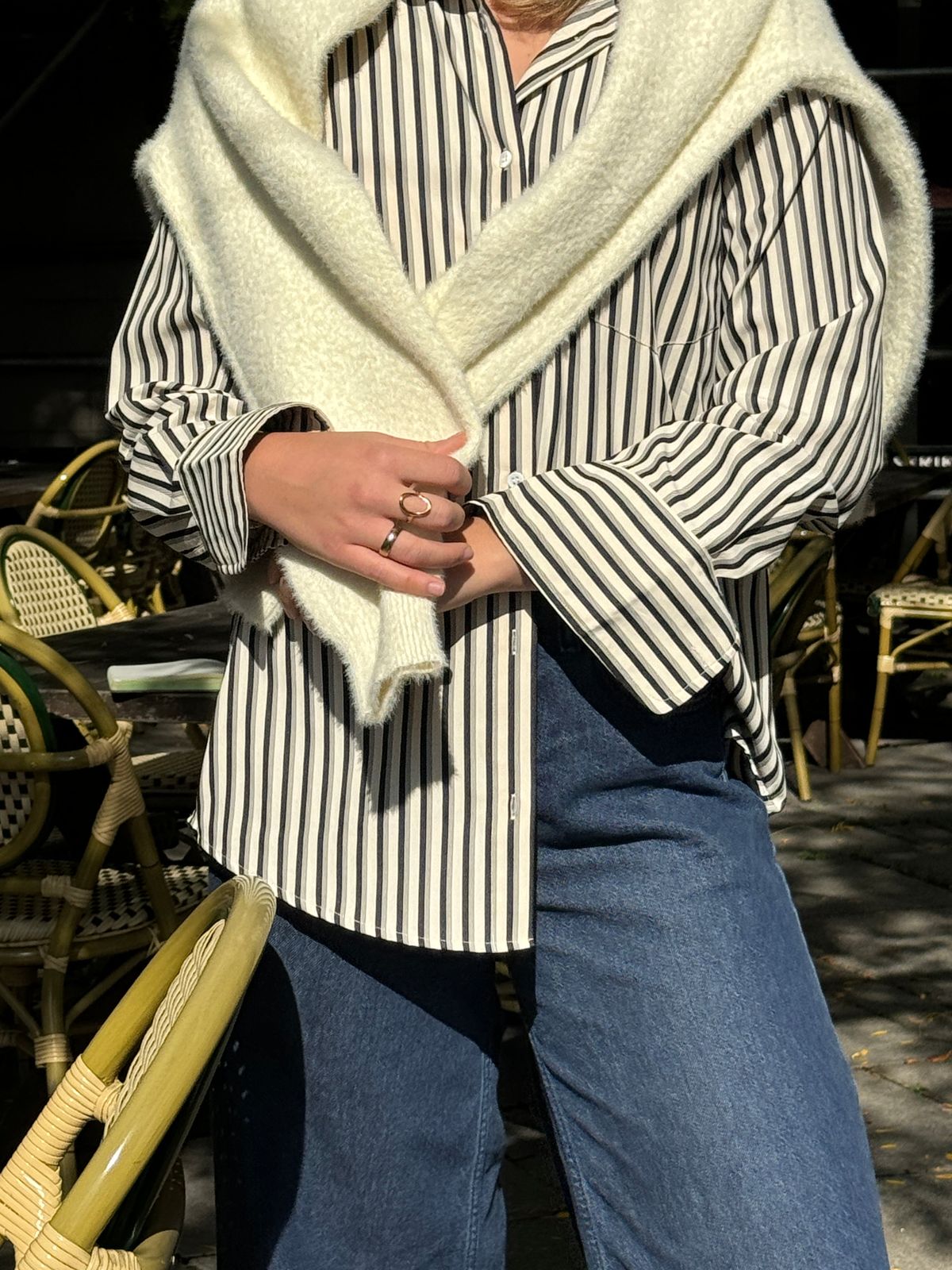Sweater Draped Over Stripes: Effortless Casual Layering — Layered Winter Outfits 2027