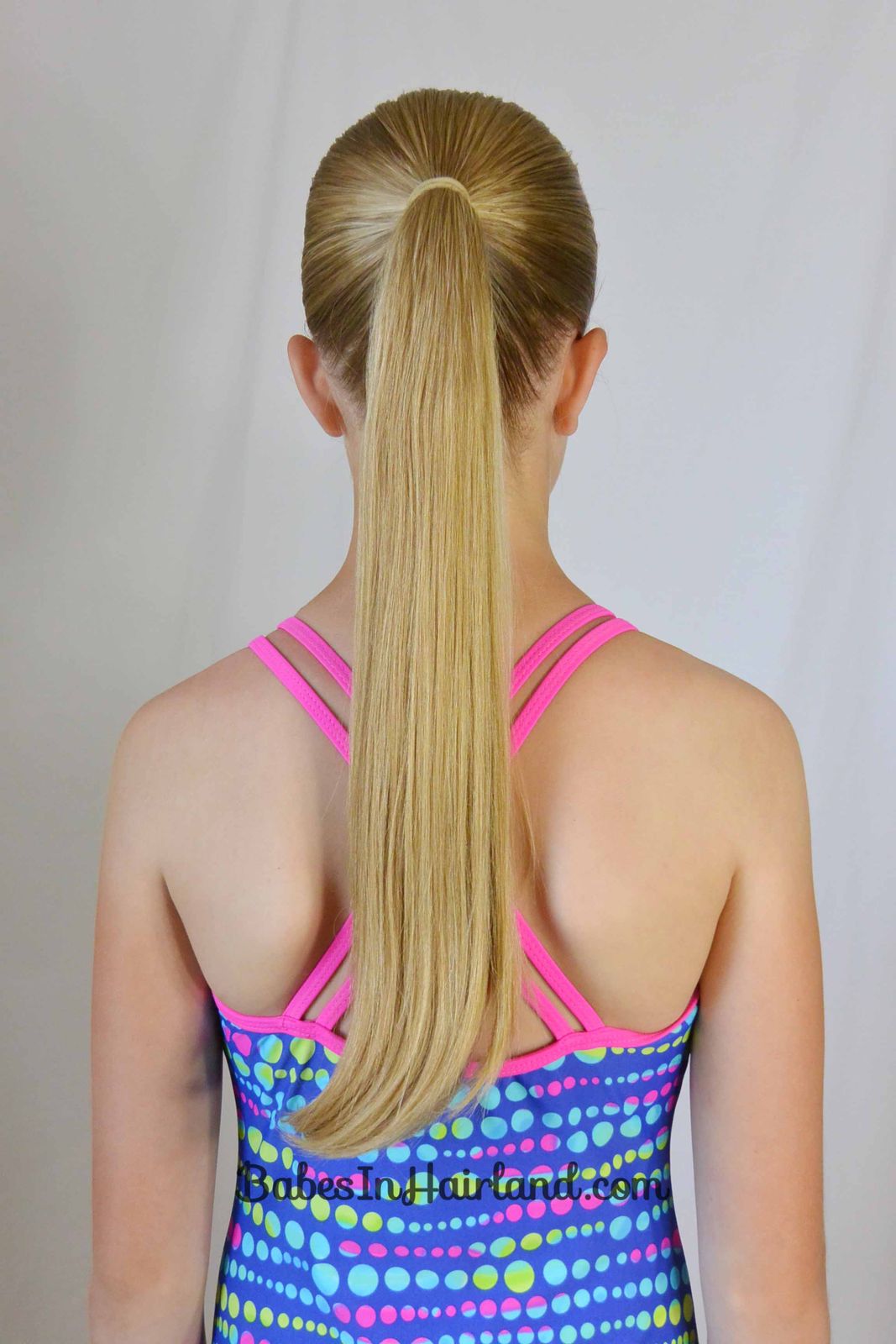 Sleek High Ponytail — Little Girl Swim Hairstyles 2027