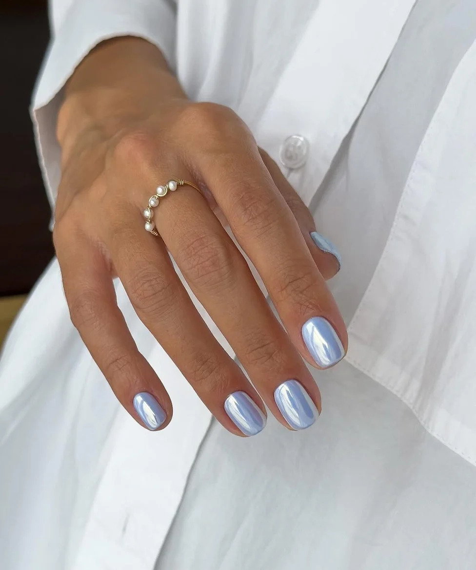Luminous Pale Blue Chrome Oval Nails Luminous Pale Blue Chrome Oval Nails — Medium Length Winter Nails 2027