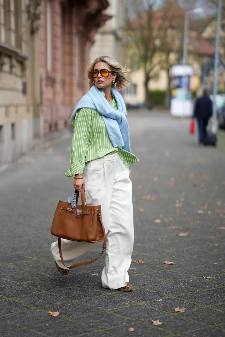 Sweater Draped Over Shoulders with Striped Shirt Sweater Draped Over Shoulders with Striped Shirt — Chilly Spring Outfits 2027