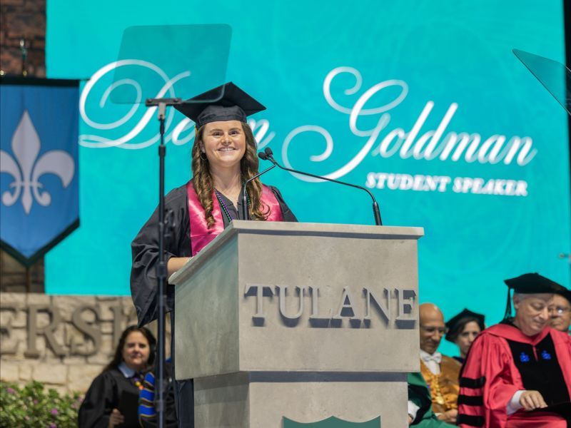 Student Speaker in Black Gown and Pink Stole — Graduation Speaker Outfits 2027