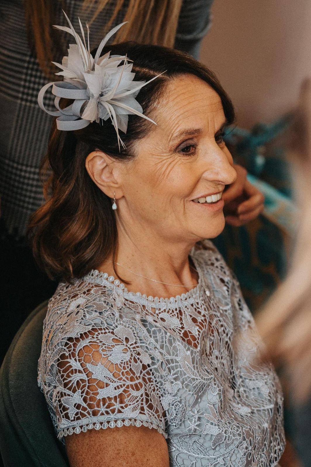 Short Wavy Brown Style With Fascinator — Down Mother of the Bride Hairstyles 2027