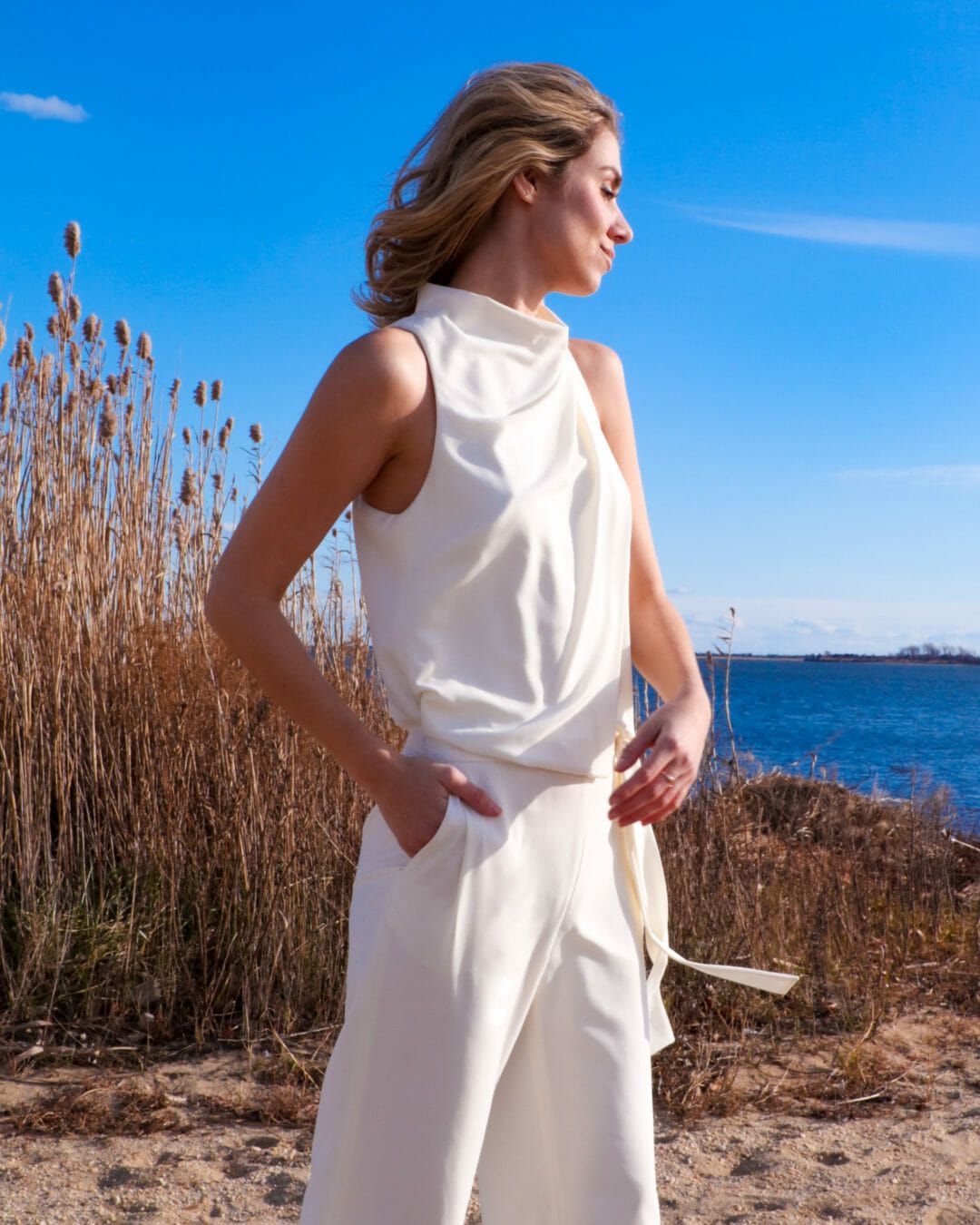 Chic White Sleeveless Culotte Jumpsuit for Daytime Elegance Chic White Sleeveless Culotte Jumpsuit for Daytime Elegance — Sleeveless Jumpsuit Outfits 2027