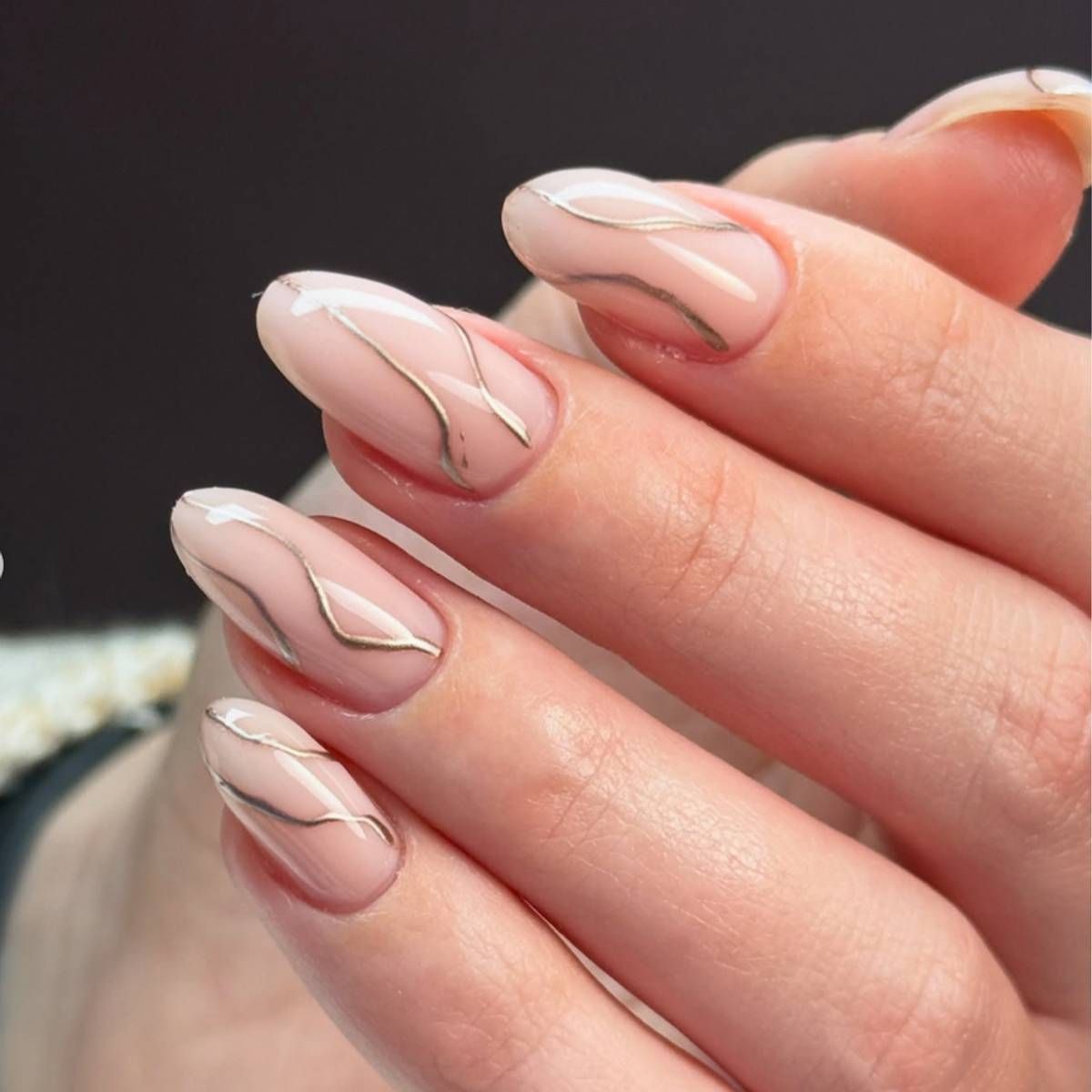 Medium Oval Sheer Nude Flowing Gold Lines Medium Oval Sheer Nude Flowing Gold Lines — Minimal Line Art Nails 2027