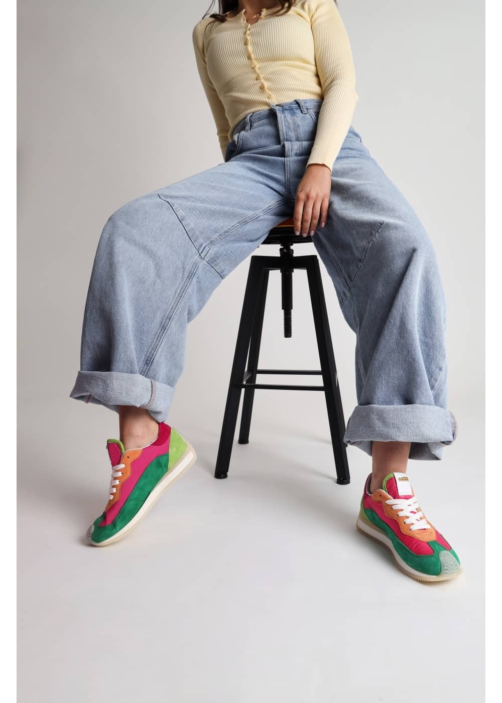 Vibrant Color-Blocked Suede Sneakers with Wide-Leg Jeans Vibrant Color-Blocked Suede Sneakers with Wide-Leg Jeans — Retro Sneakers Outfits 2027