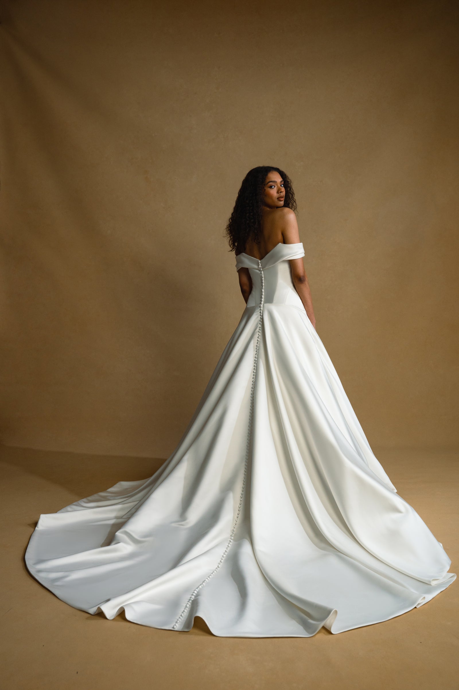 Elegant Train: Off-the-Shoulder Ballgown with Button Detail — Wedding Dress Trends 2027