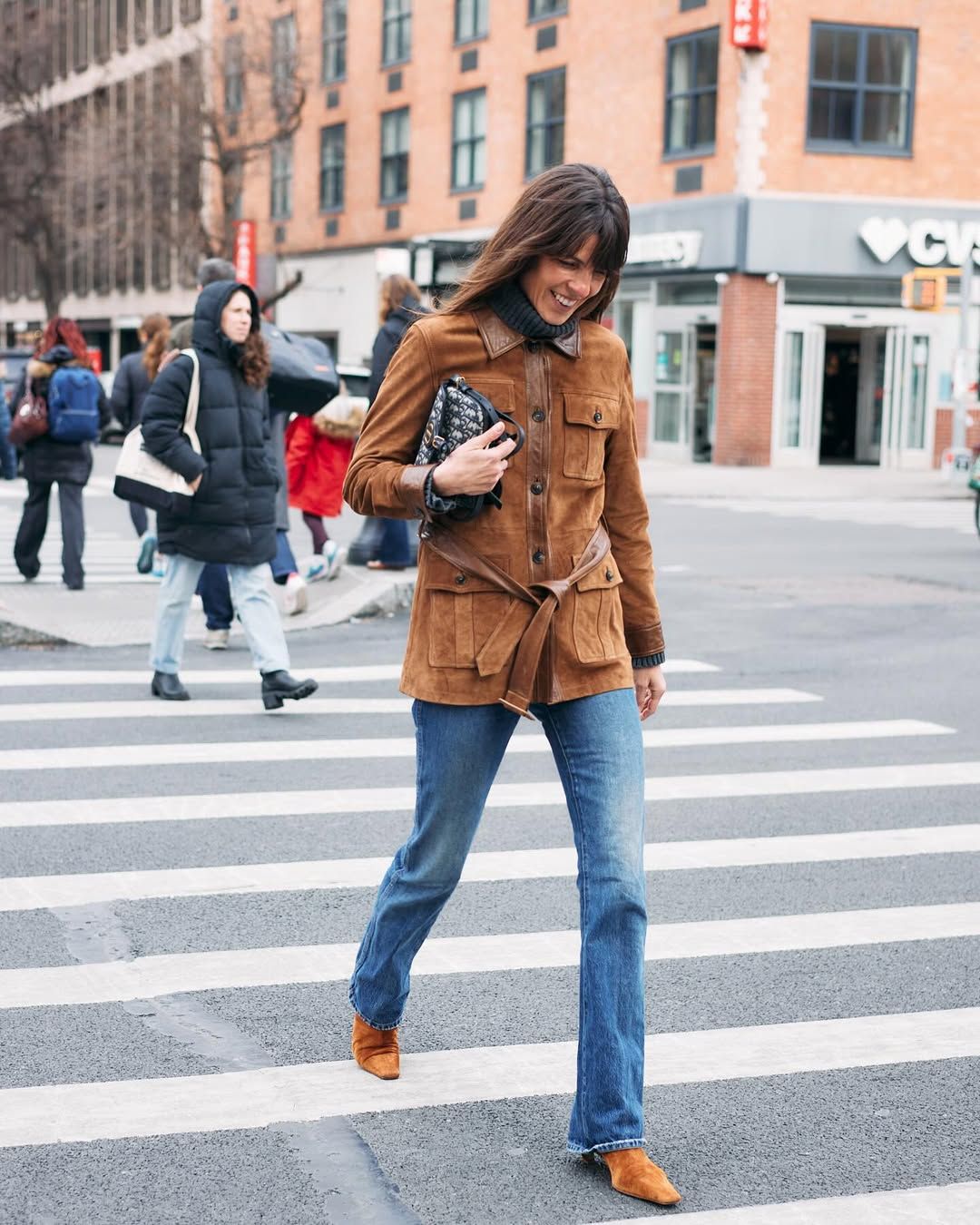 Black Trench Coat Over White Top with Blue Bootcut Jeans Black Trench Coat Over White Top with Blue Bootcut Jeans — Blue Bootcut Jeans Outfits 2027
