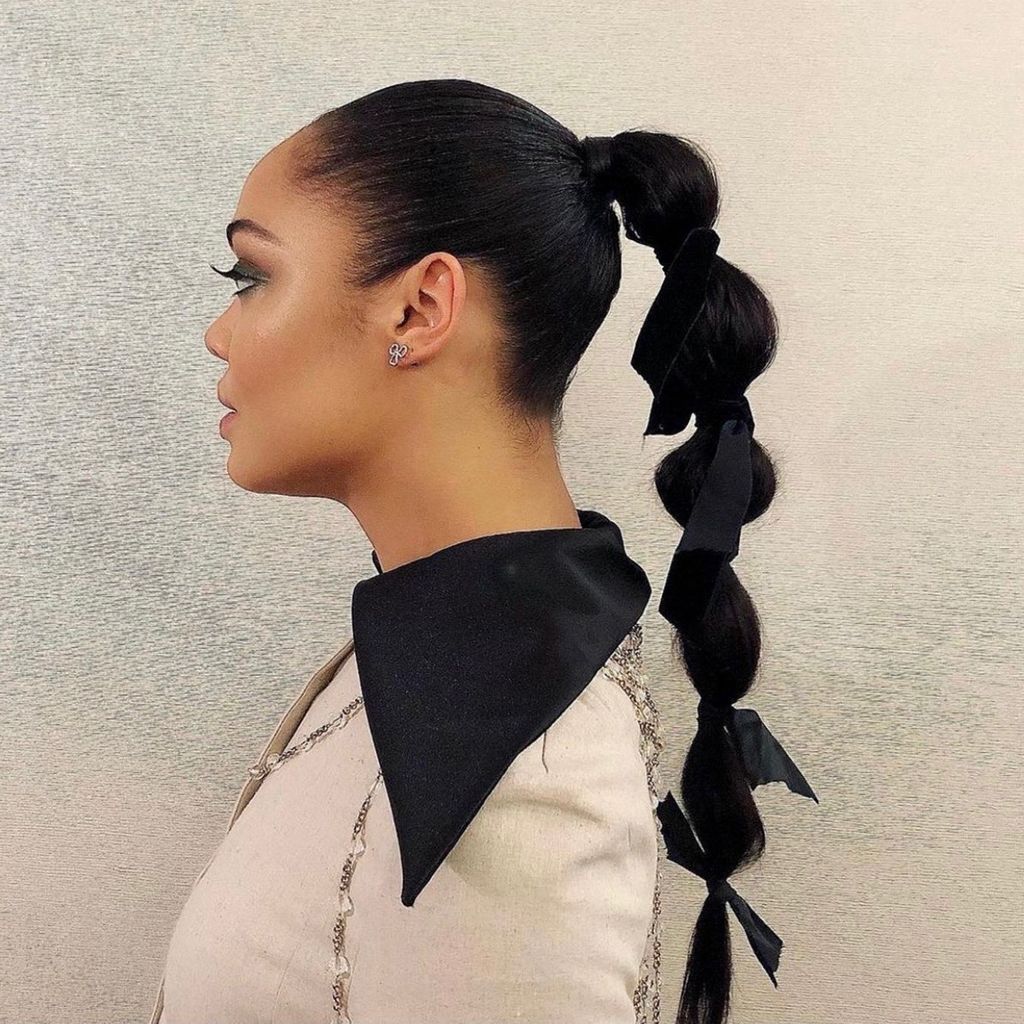 Bubble Ponytail With Ribbon Accents Bubble Ponytail With Ribbon Accents — Holiday Hairstyles 2026