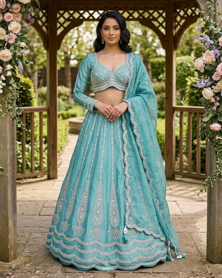 Teal Embroidered Lehenga Set with Silver Embellishments Teal Embroidered Lehenga Set with Silver Embellishments — Powder Blue Outfits 2027