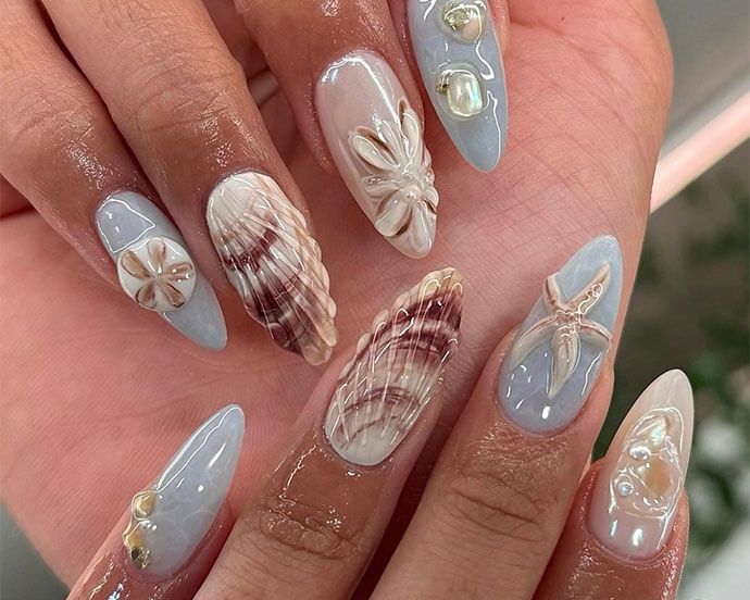 3D Seashell Embellished Stiletto Nails 3D Seashell Embellished Stiletto Nails — Swim Nails Team Colors 2027