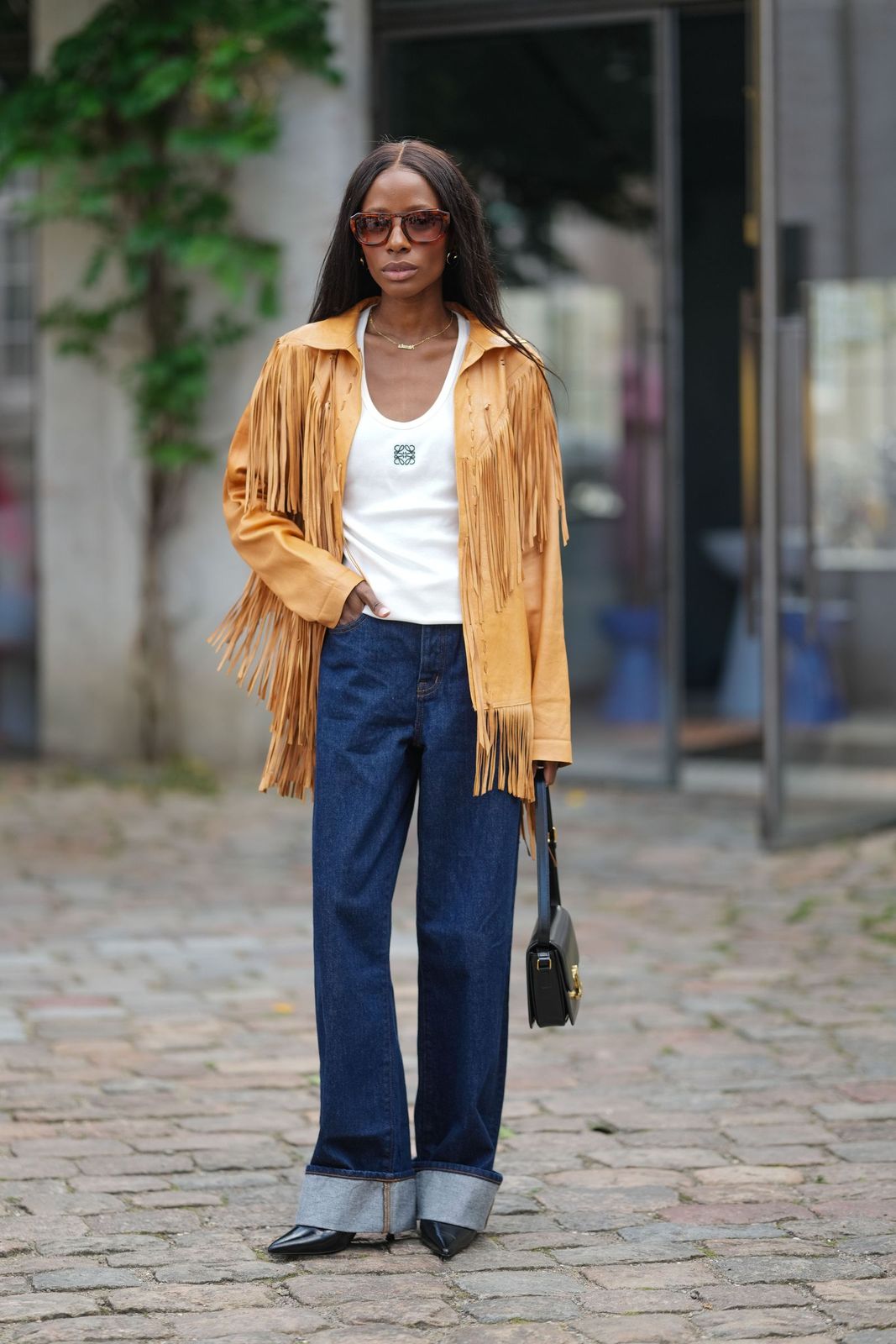 Tan Fringed Leather Jacket with Tank and Wide-Leg Jeans Tan Fringed Leather Jacket with Tank and Wide-Leg Jeans — Light Jacket Outfits 2027