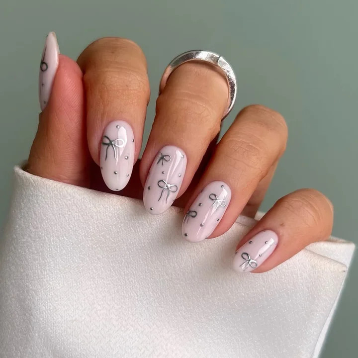 Pale Pink with Silver Bows and Dots Pale Pink with Silver Bows and Dots — Winter Gel Nail Colors 2027